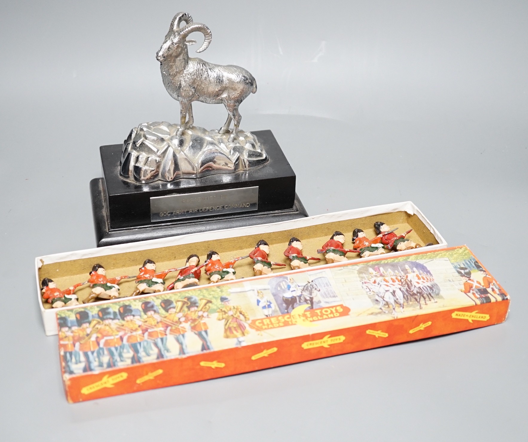 Presentation sculpture to Com. Jonathan Lett by The Army Air Defence Command together with a set of lead soldiers. Tallest 20cm